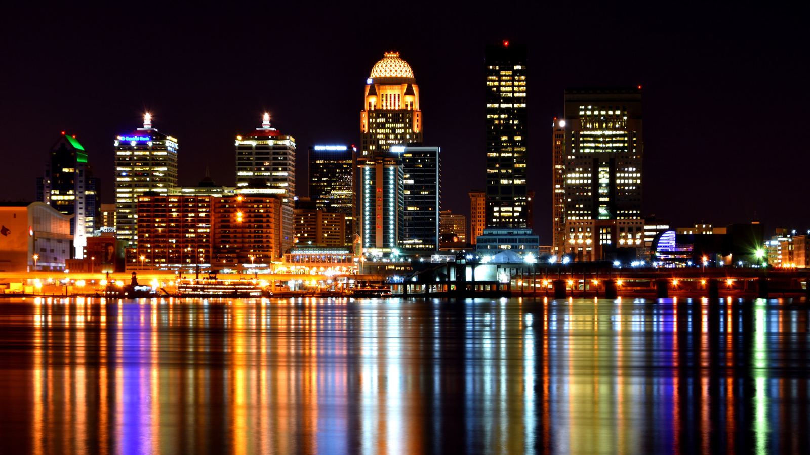 Louisville skyline at night reflected in the Ohio River