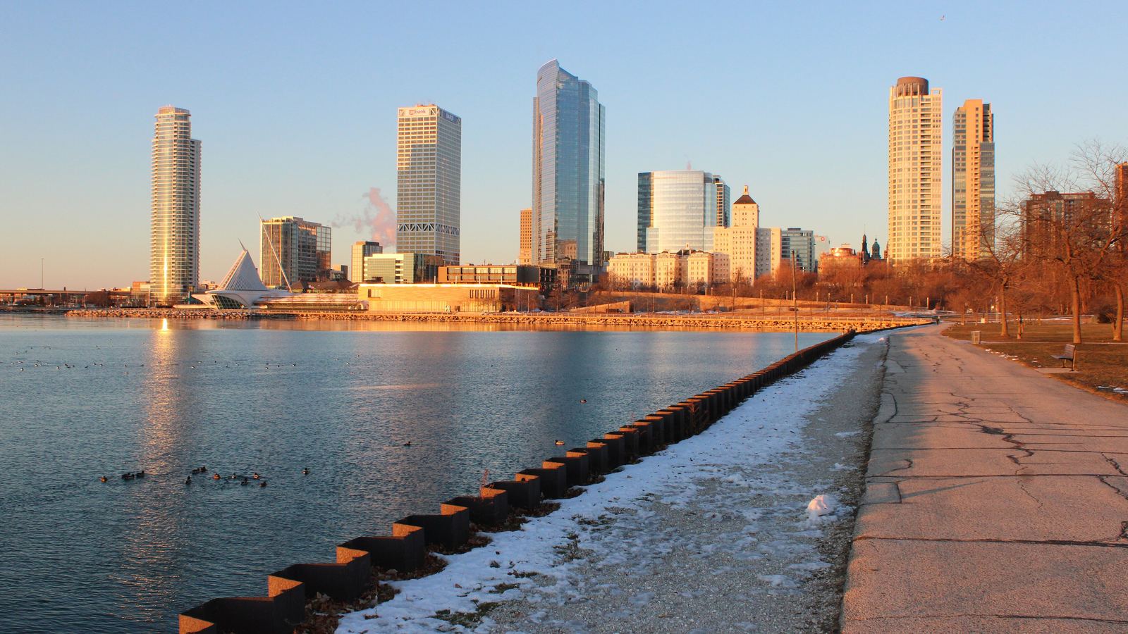 Milwaukee skyline at sunrise from Veterans Park on Lake Michigan